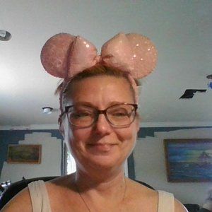 Brand new Walt Disney Minnie Sequin Ears With Bow